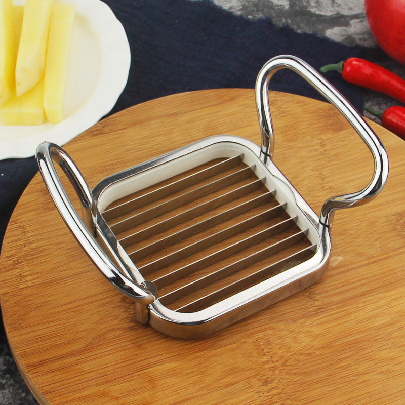 MultiCutter Julienne-Einsatz mit geschnittenen Pommes und frischem Gemüse